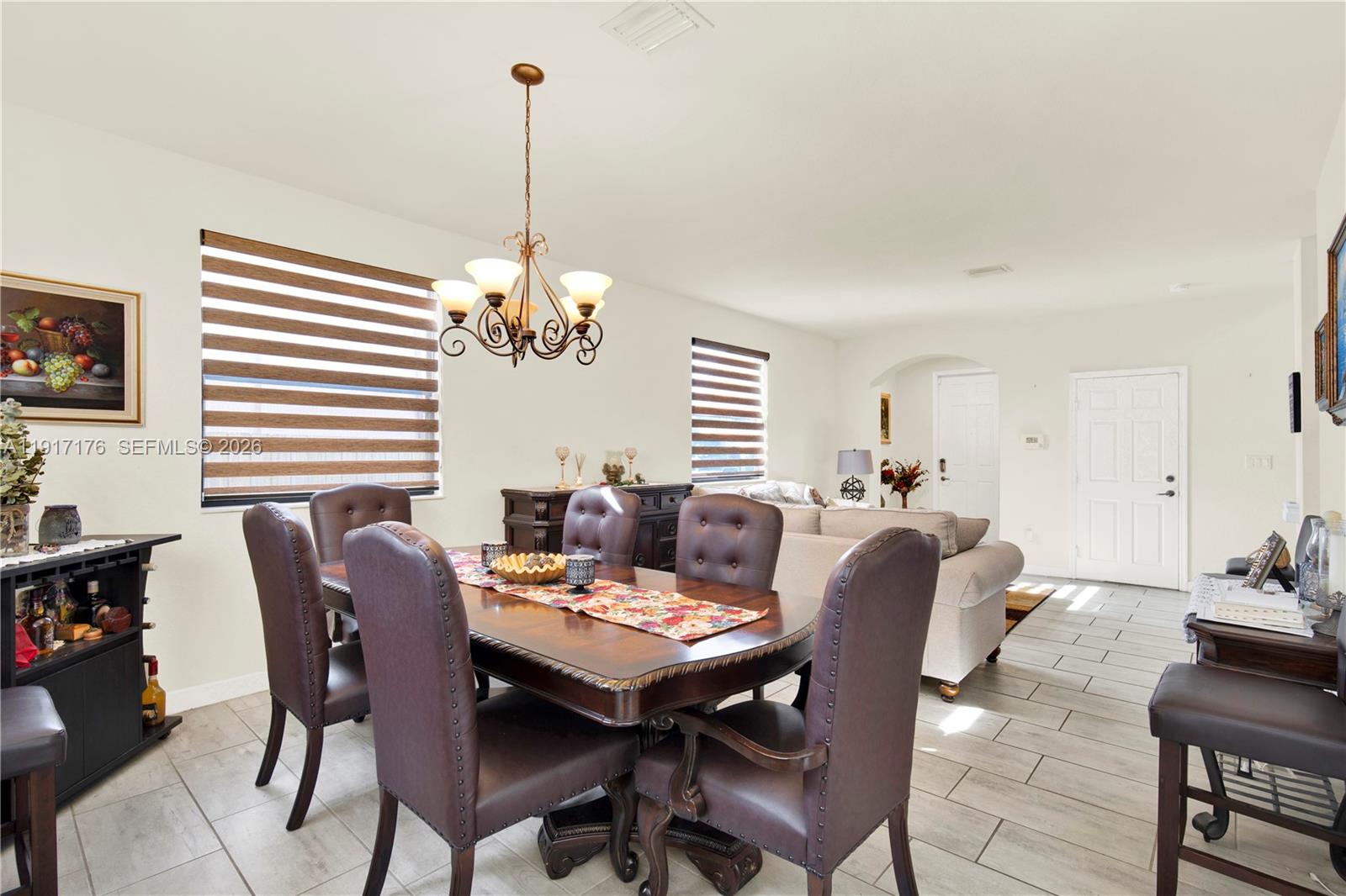 217 Northeast 23rd Terrace Homestead, FL 33033 - Photo 12 of 59 a view of a dining room with furniture and window