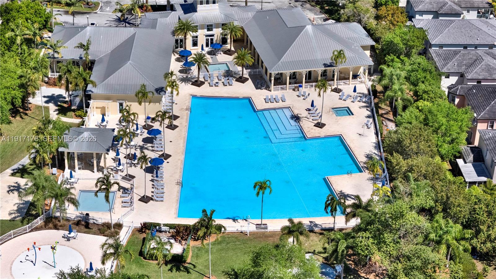 217 Northeast 23rd Terrace Homestead, FL 33033 - Photo 42 of 59 an aerial view of multiple houses with yard