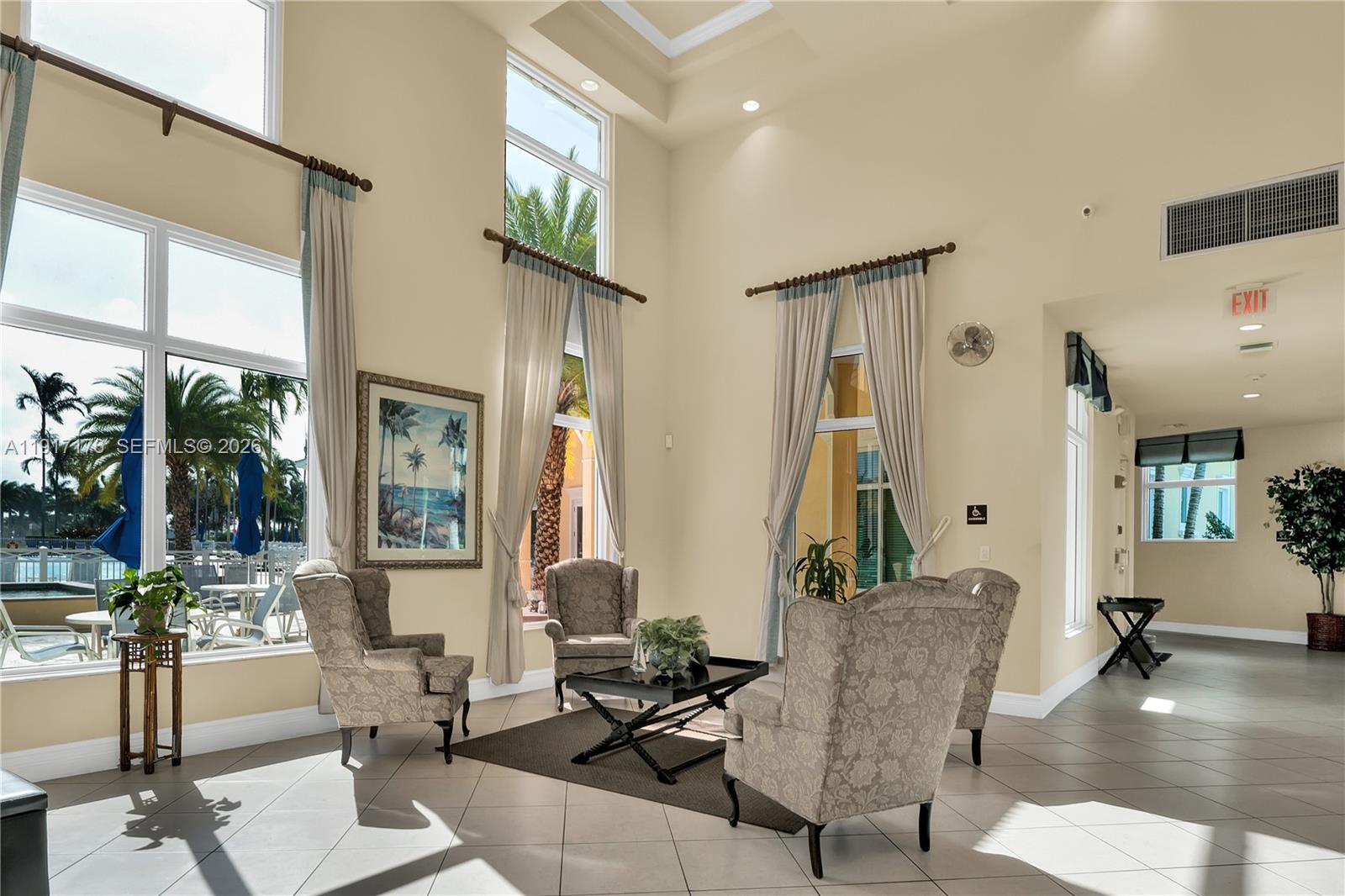 217 Northeast 23rd Terrace Homestead, FL 33033 - Photo 57 of 59 a living room with couches and a dining table with garden view
