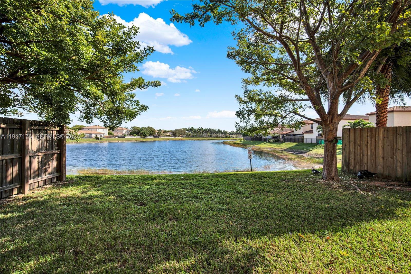 217 Northeast 23rd Terrace Homestead, FL 33033 - Photo 59 of 59 a view of a lake with a big yard