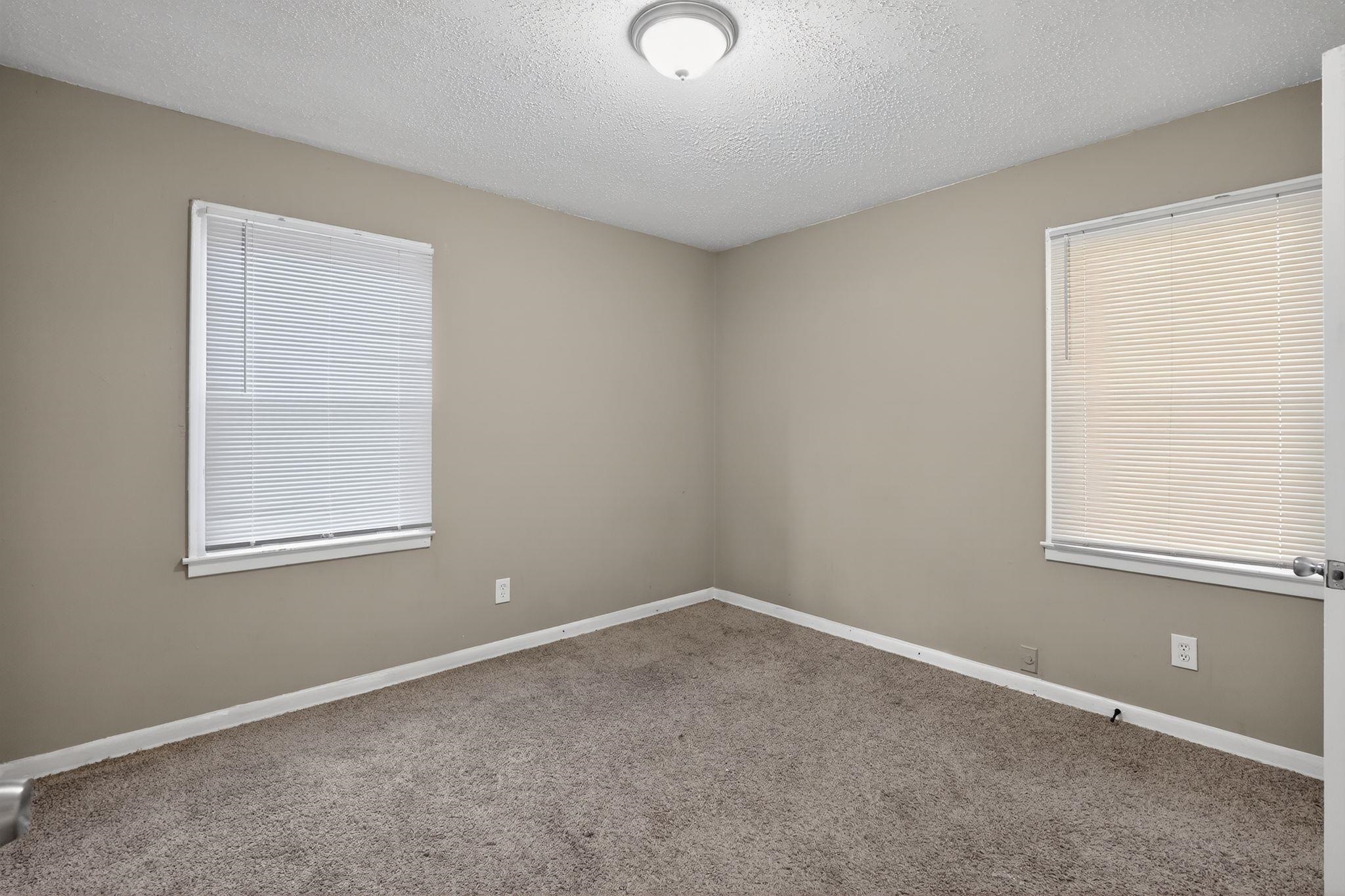 2144 St Elmo Avenue Memphis, TN 38127 - Photo 14 of 31 an empty room with a window