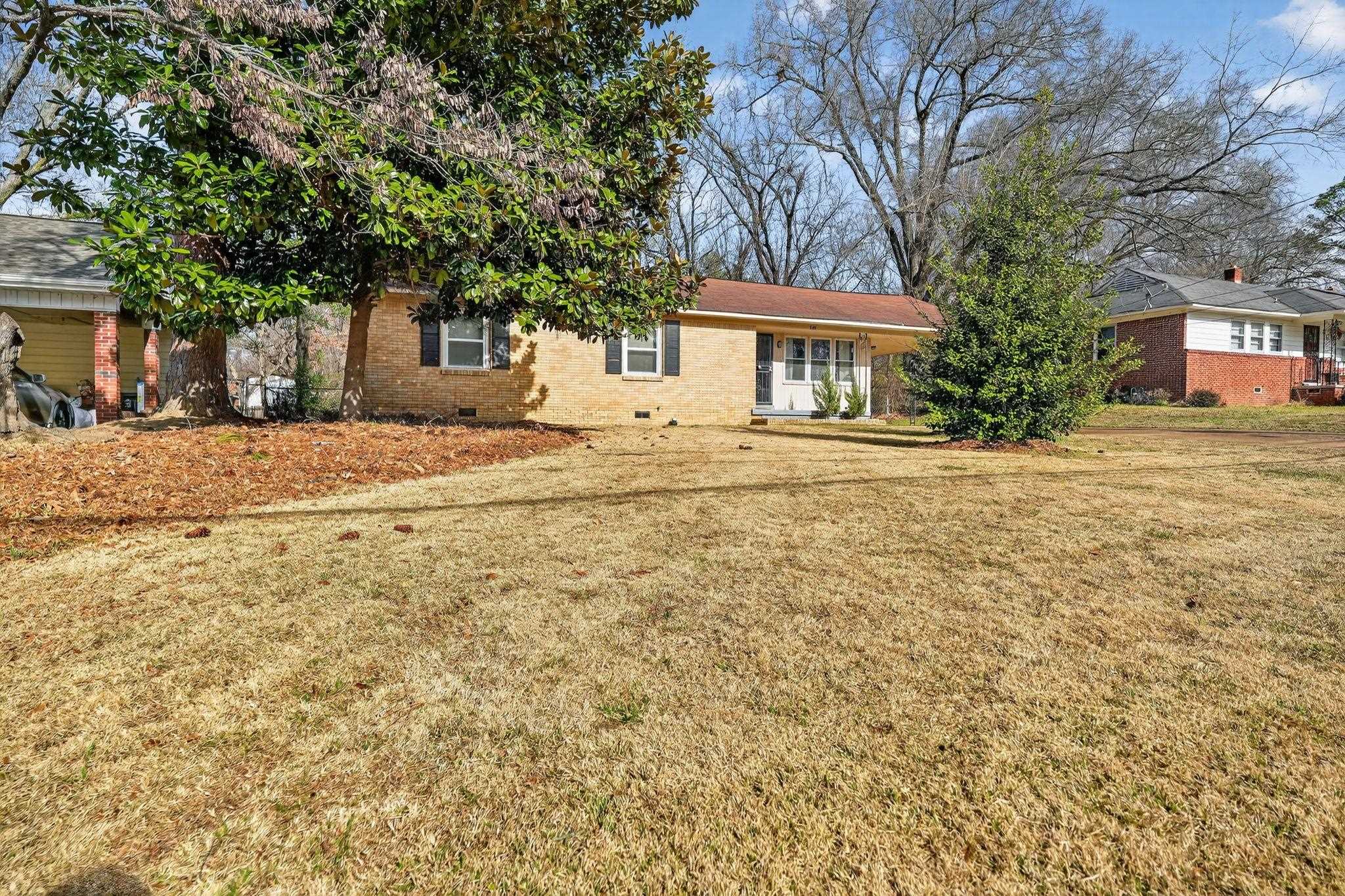 2144 St Elmo Avenue Memphis, TN 38127 - Photo 2 of 31 a front view of a house with a garden