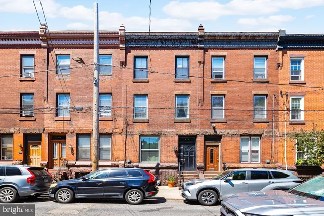 a car parked in front of a building