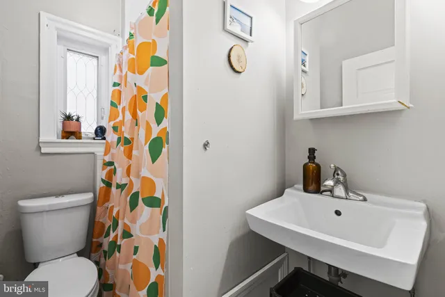 a bathroom with a sink and a toilet