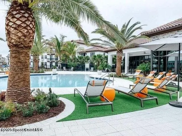 a view of outdoor space yard swimming pool and patio