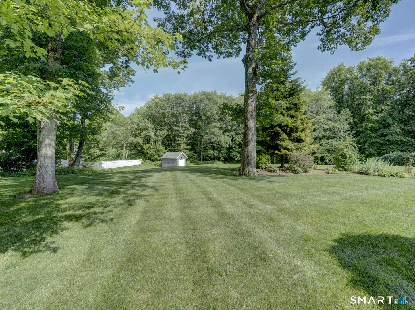 13 Executive Hill Road Wolcott, CT 06716 - Photo 3 of 40 a view of outdoor space with green field and trees