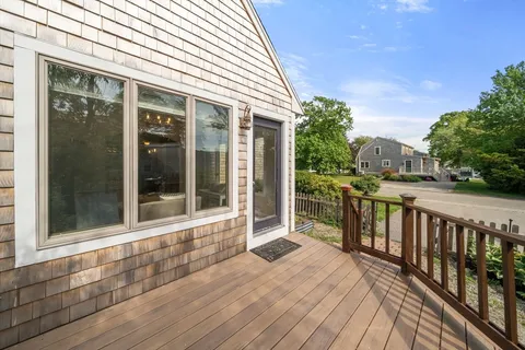 a view of a house with porch and wooden floor