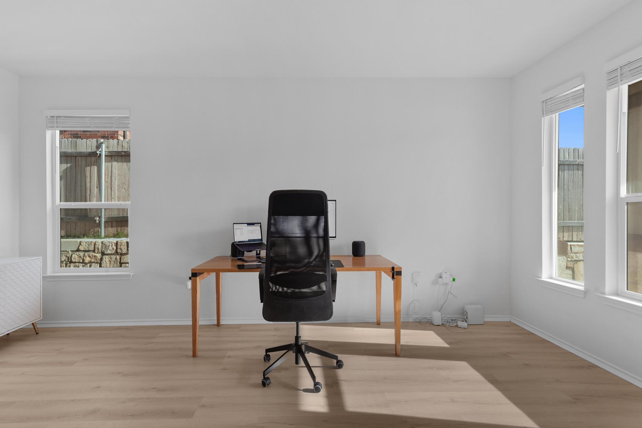 4712 Pear Light Rd Manor Manor, TX 78653 - Photo 19 of 39 Office featuring wood finished floors and baseboards