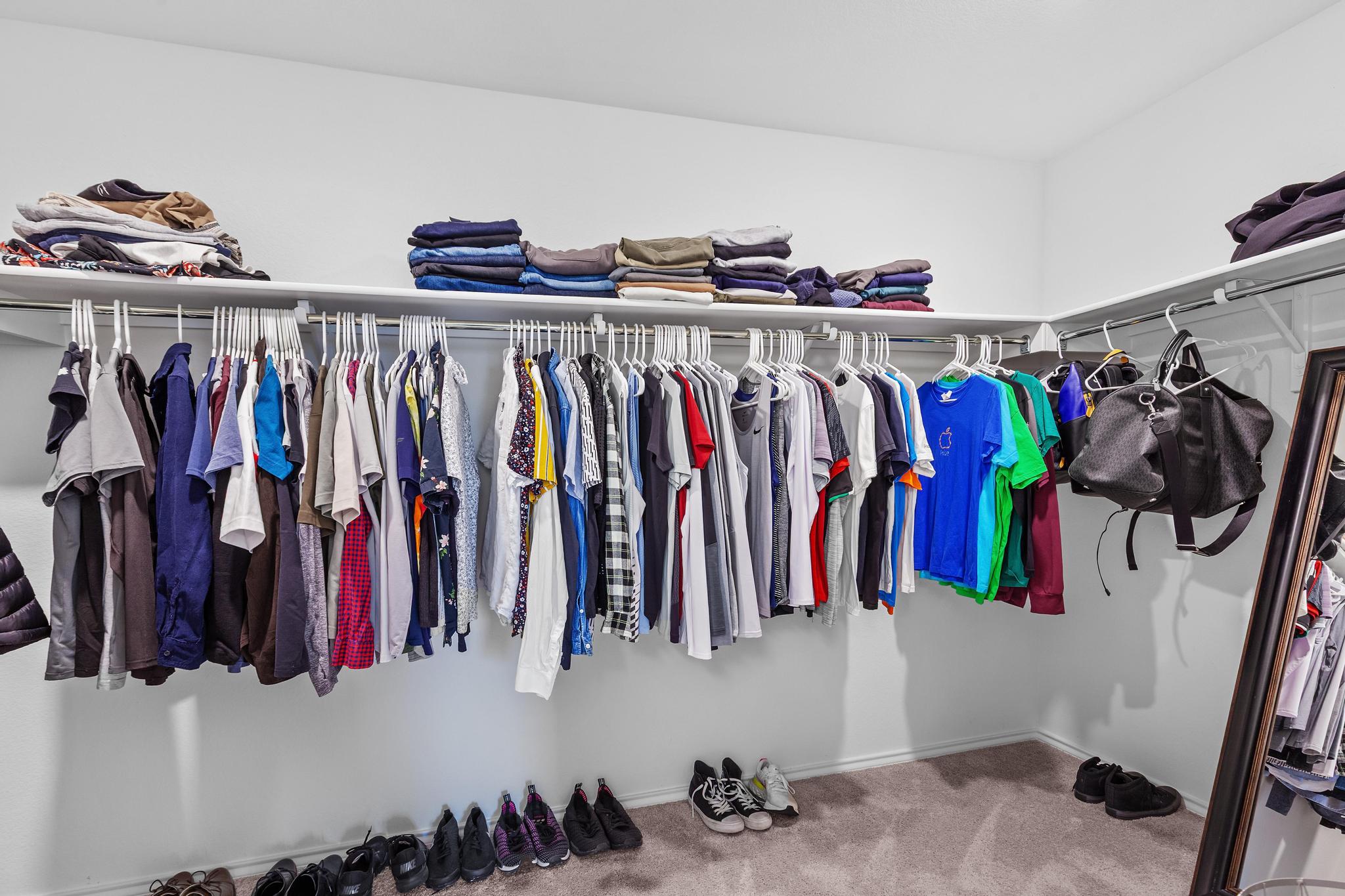 4712 Pear Light Rd Manor Manor, TX 78653 - Photo 35 of 39 Walk in closet featuring carpet flooring