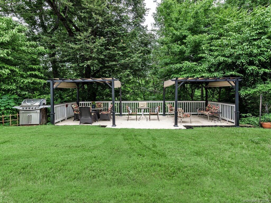 253 Hyde Park Lane Fort Mill, SC 29708 - Photo 2 of 26 a view of a backyard with a sitting area