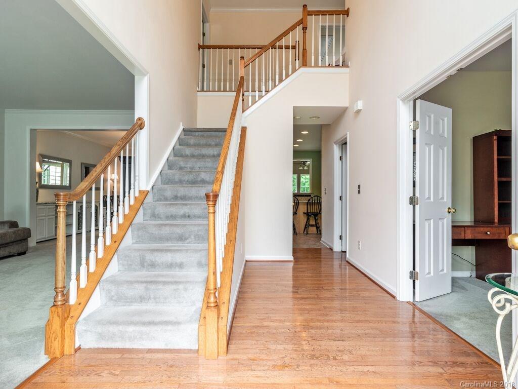 253 Hyde Park Lane Fort Mill, SC 29708 - Photo 13 of 26 a view of entryway and hall with wooden floor