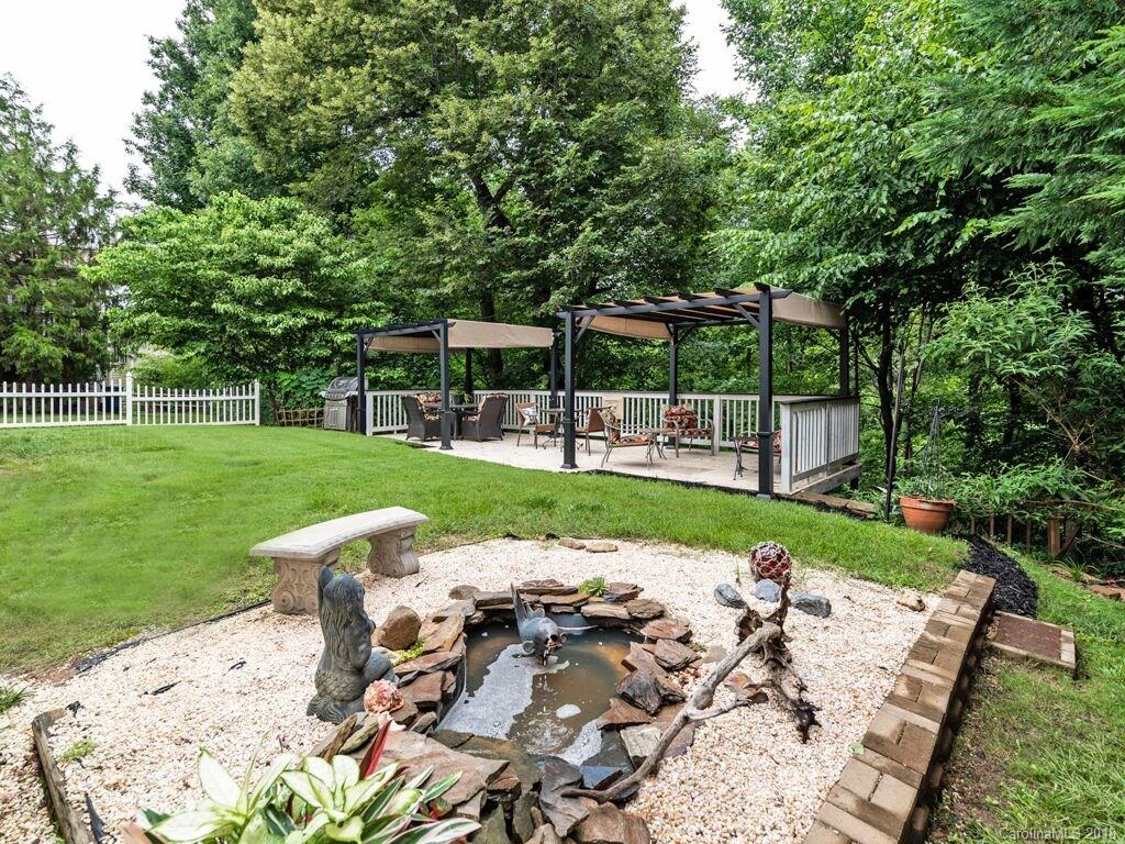 253 Hyde Park Lane Fort Mill, SC 29708 - Photo 22 of 26 a view of a park with seating space
