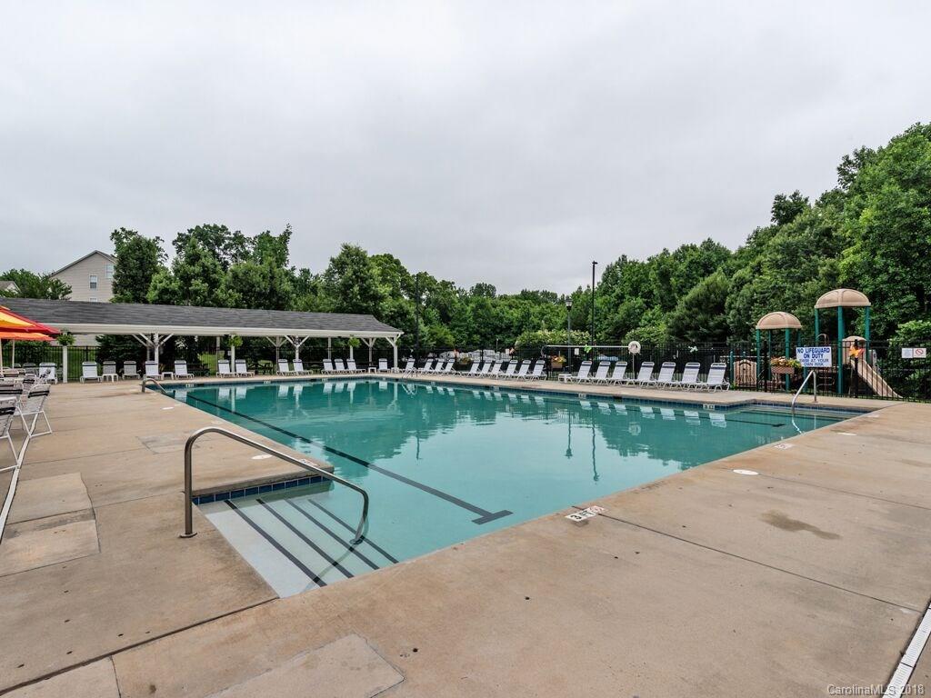 253 Hyde Park Lane Fort Mill, SC 29708 - Photo 24 of 26 a view of swimming pool with a yard