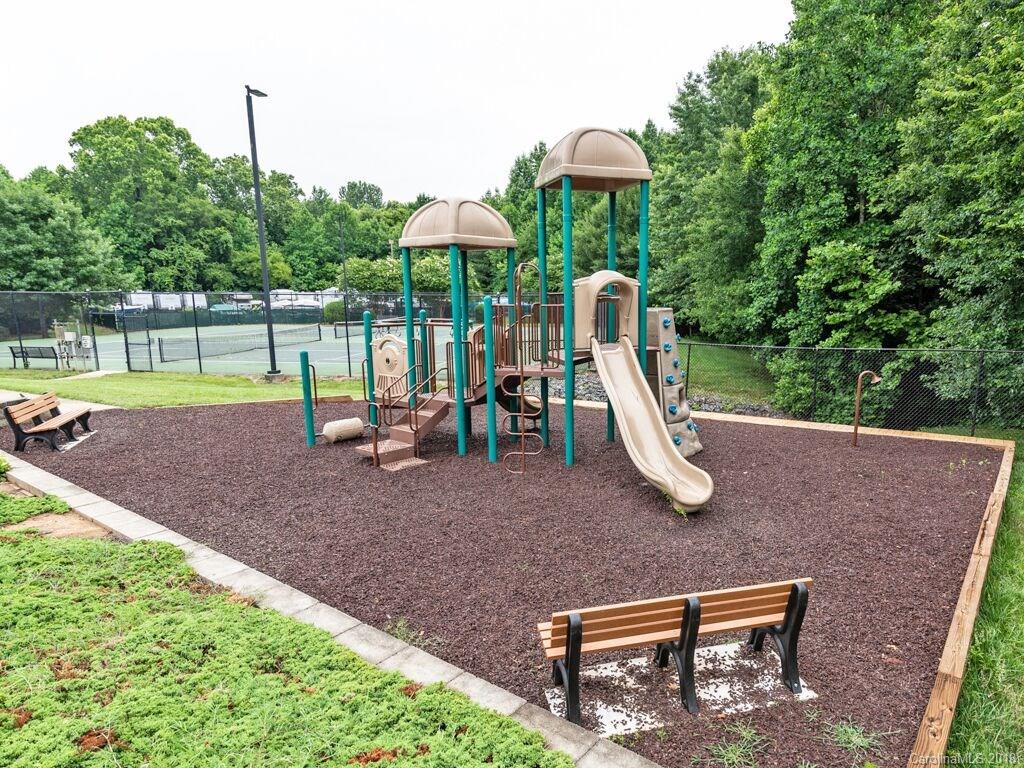 253 Hyde Park Lane Fort Mill, SC 29708 - Photo 26 of 26 a view of a park with slide