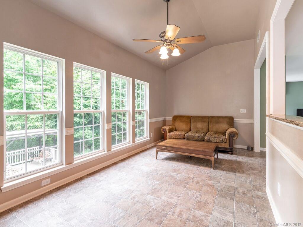 253 Hyde Park Lane Fort Mill, SC 29708 - Photo 9 of 26 a living room with furniture and a large window