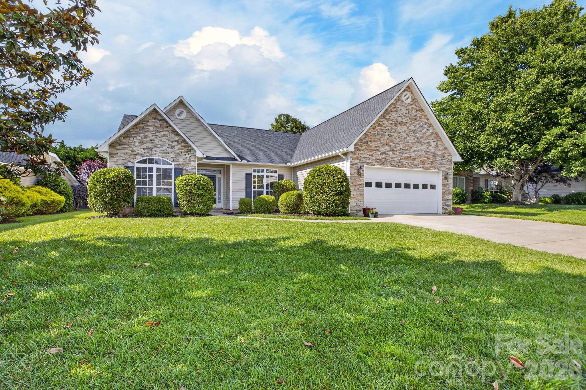 268 Farm Valley Road Fletcher, NC 28732 - Photo 1 of 30 a front view of a house with garden