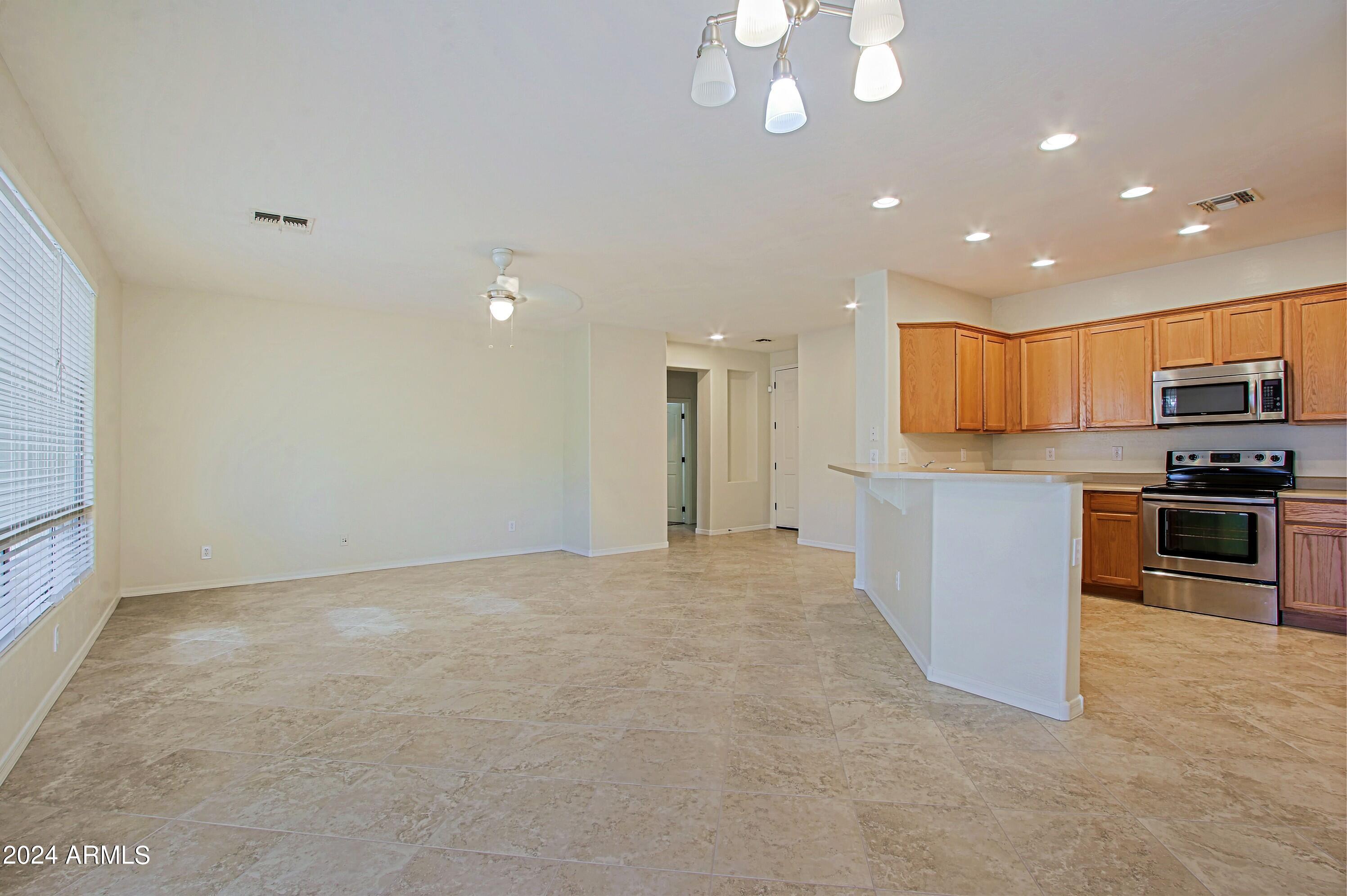 4298 South Ranger Trail Gilbert, AZ 85297 - Photo 3 of 40 Dining Area, Greatroom and Kitchen