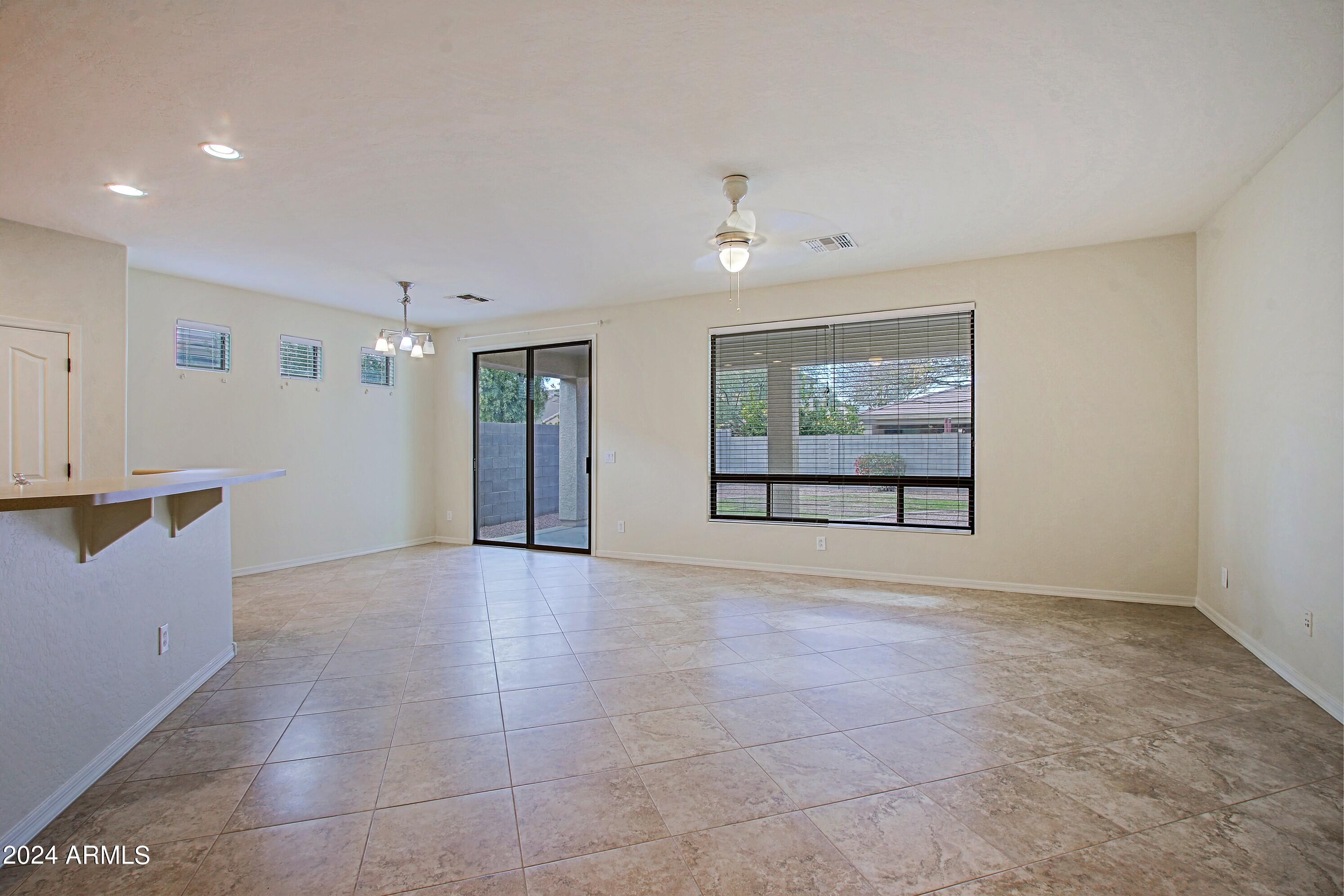4298 South Ranger Trail Gilbert, AZ 85297 - Photo 4 of 40 Greatroom and Dining Area