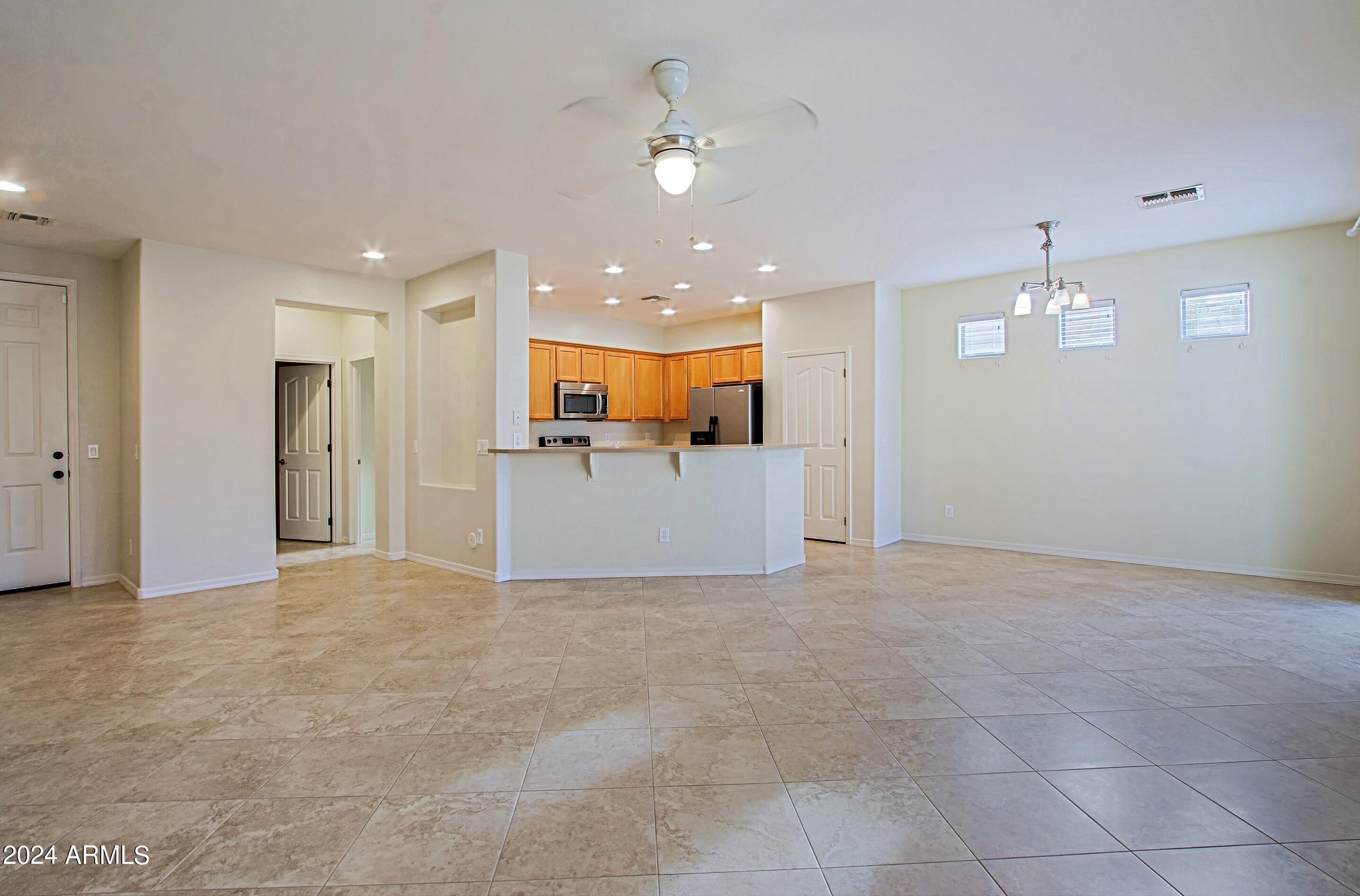 4298 South Ranger Trail Gilbert, AZ 85297 - Photo 5 of 40 Greatroom, Dining Area and Kitchen