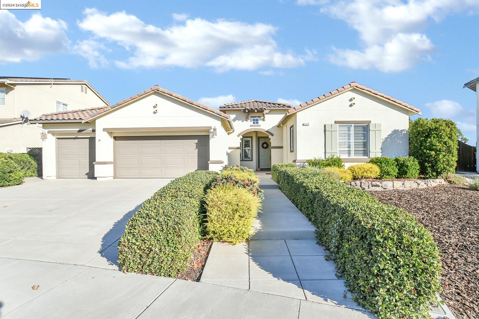 4018 Blacksmith Circle Oakley, CA 94561 - Photo 1 of 1 a front view of a house with a yard
