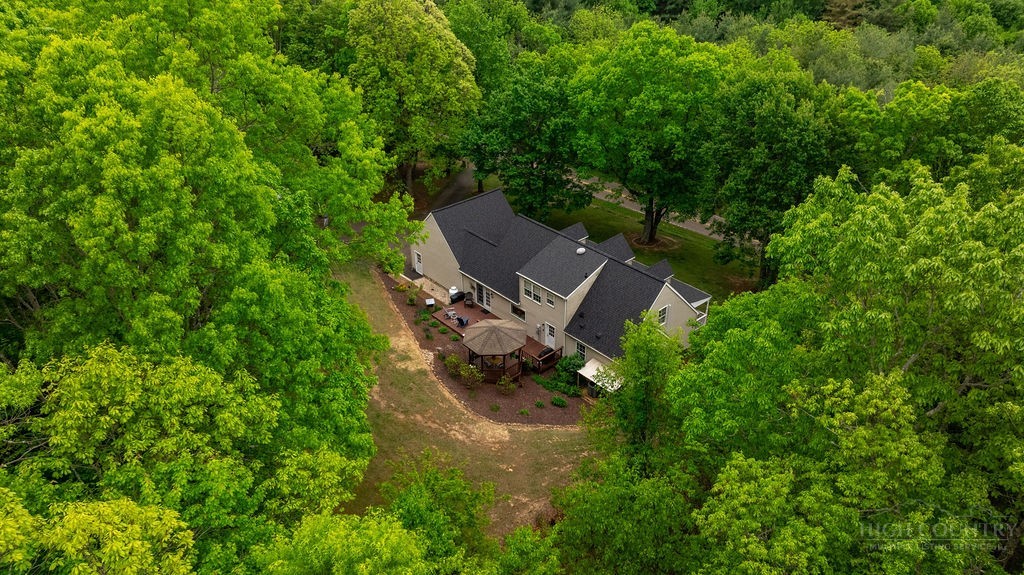 970 Vox Road Sparta, NC 28675 - Photo 38 of 50 an aerial view of a house with a yard