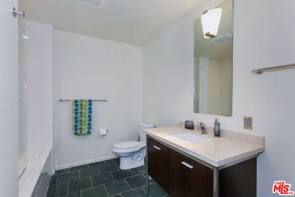 a bathroom with a sink and a toilet