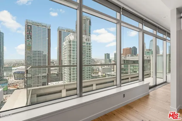 a view of a city from a living room