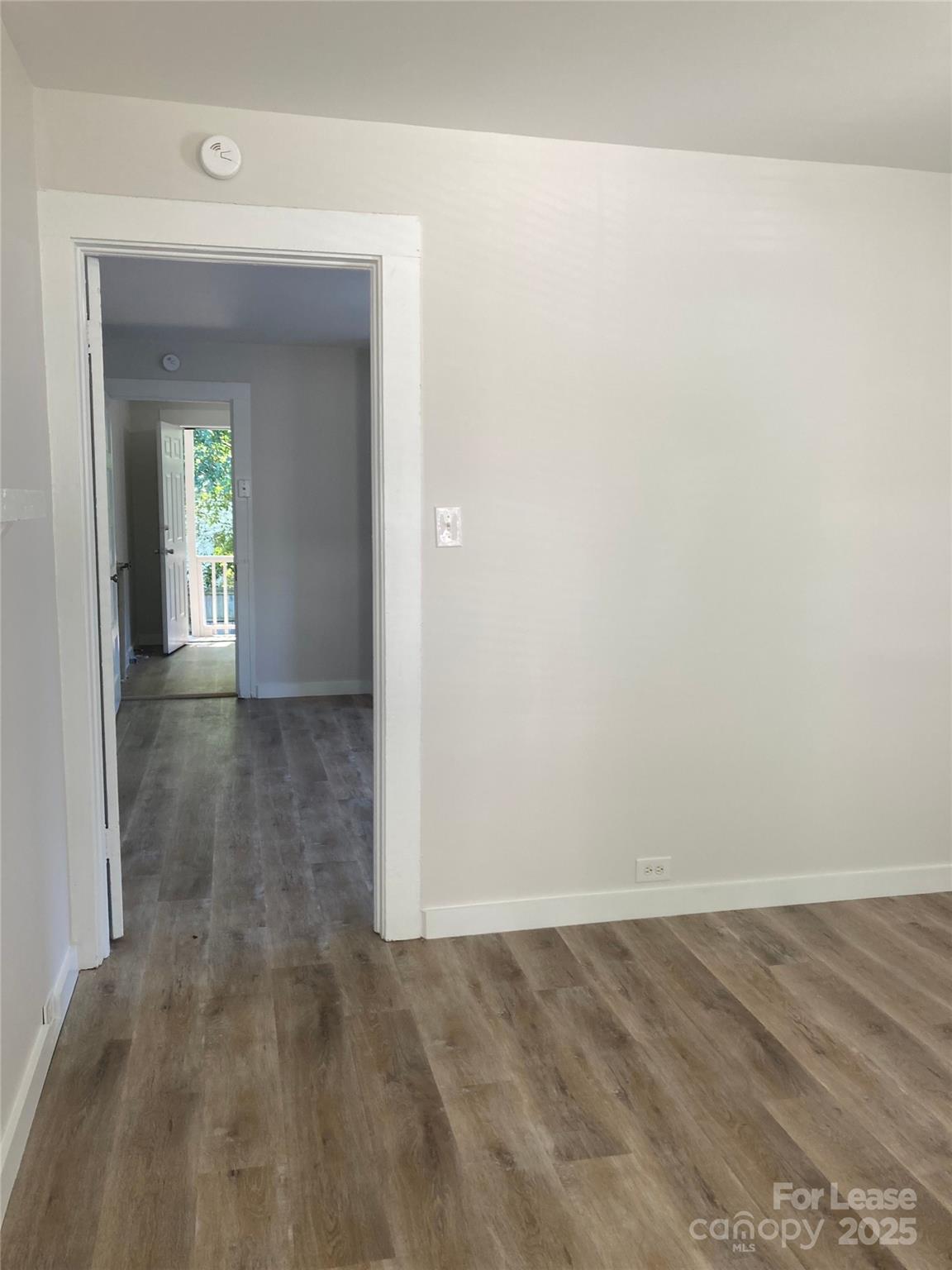 654 Wilson Street Kannapolis, NC 28083 - Photo 7 of 15 a view of a room with wooden floor
