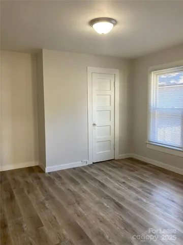 a view of a kitchen with granite countertop cabinets and a sink