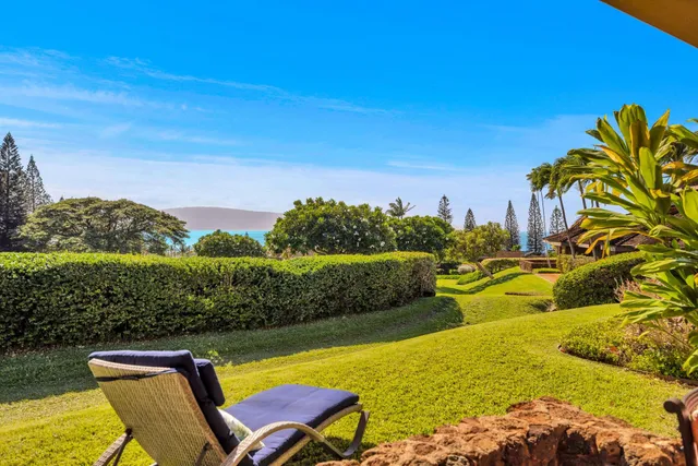 a view of a swimming pool with lounge chair