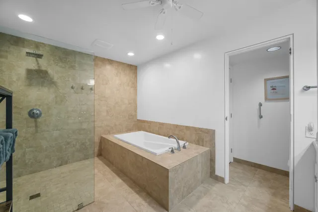 a bathroom with a bathtub sink and toilet