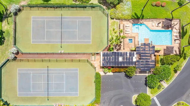a view of a swimming pool with a balcony