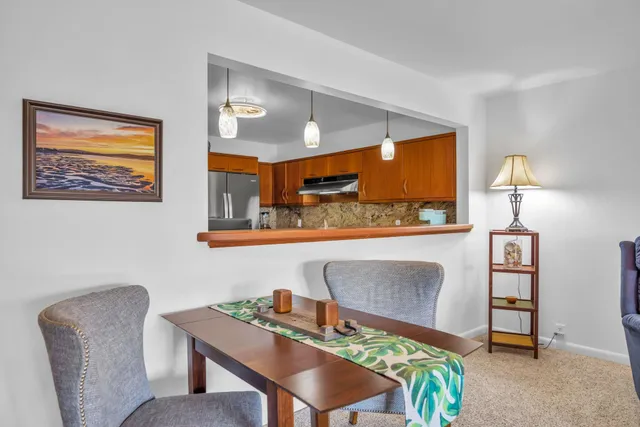 a view of a dining room with furniture