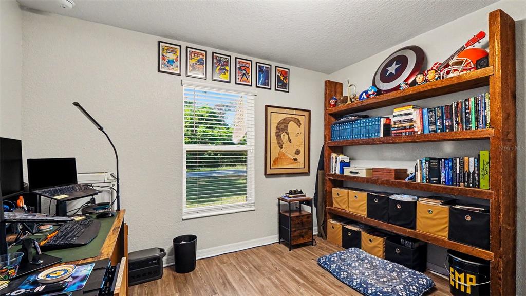 6201 East Peach Street Inverness, FL 34452 - Photo 20 of 30 a view of room with workspace and a window