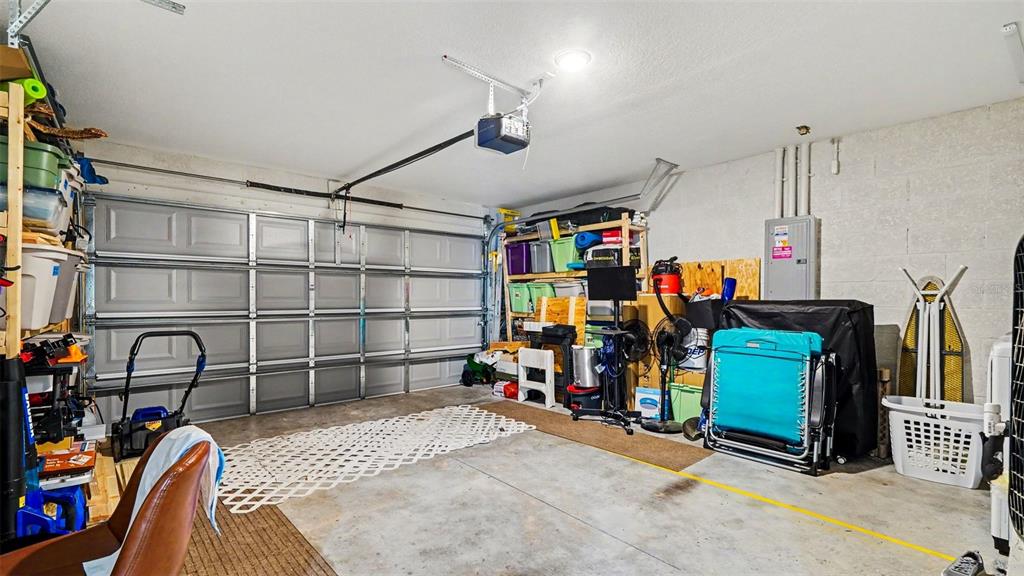 6201 East Peach Street Inverness, FL 34452 - Photo 27 of 30 a view of a garage with rack and bicycle