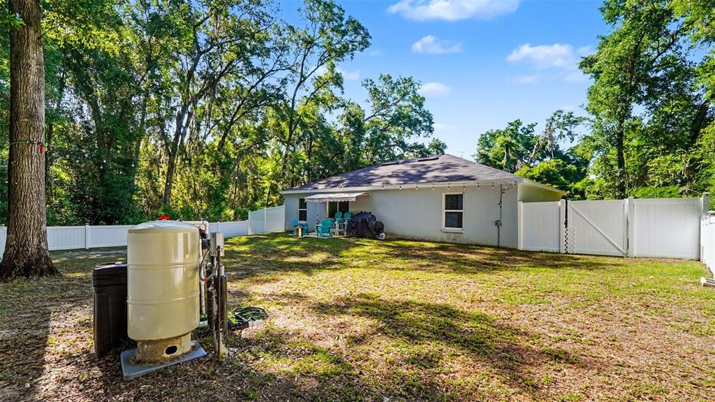 6201 East Peach Street Inverness, FL 34452 - Photo 29 of 30 a view of a house with backyard