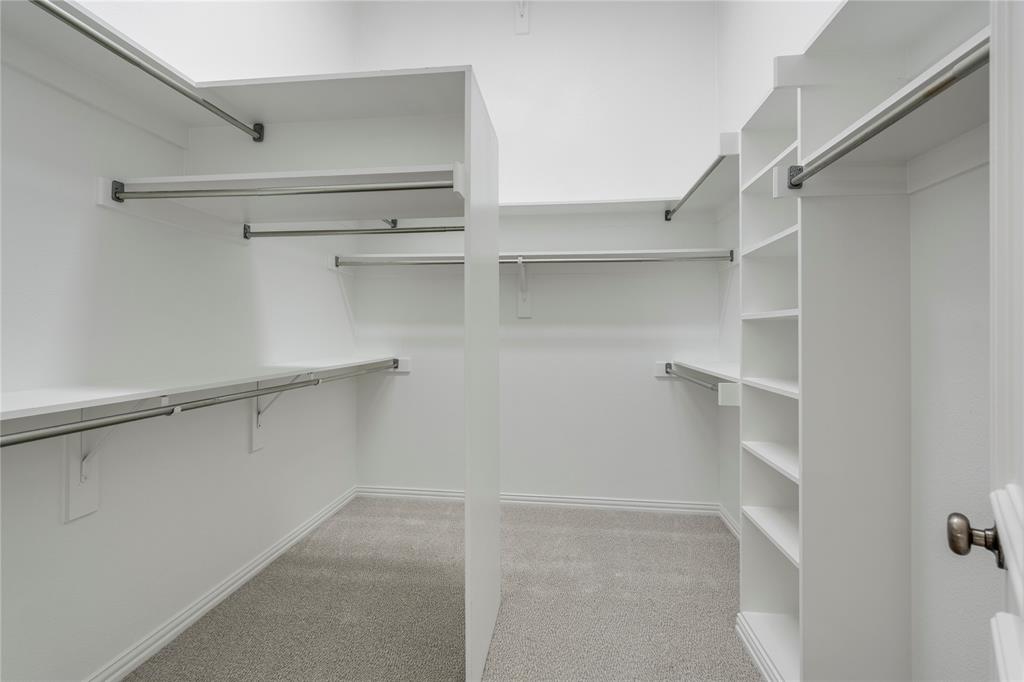 1425 Kingsmill Court Coppell, TX 75019 - Photo 30 of 30 a view of an empty walk in closet