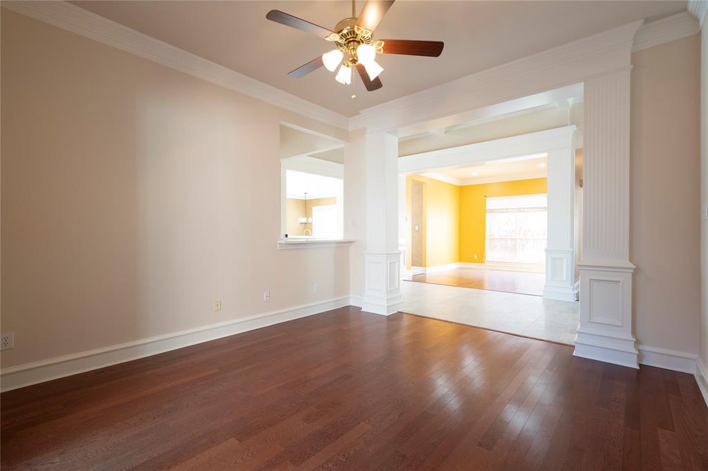 1425 Kingsmill Court Coppell, TX 75019 - Photo 3 of 30 wooden floor in an empty room with a window
