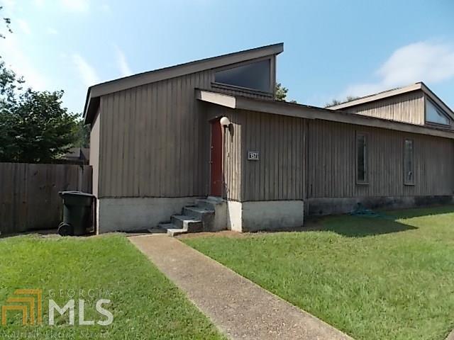 157 Valley Road, Unit 30 Statesboro, GA 30458 - Photo 1 of 1 a backyard of a house