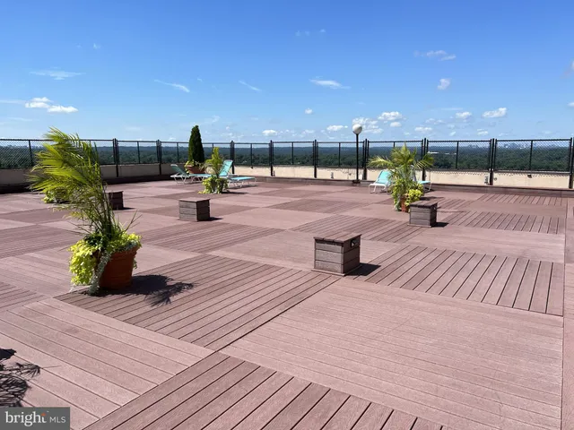 a view of a terrace with seating space