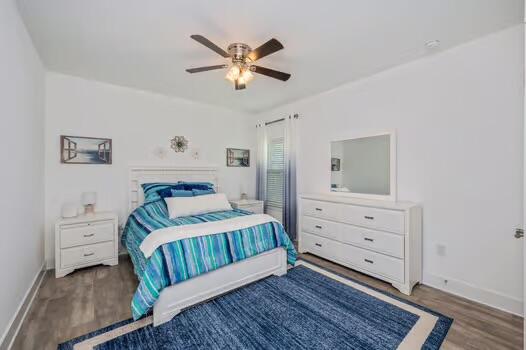 512 Vale Loop Crestview, FL 32536 - Photo 56 of 83 a bedroom with a bed and a dresser