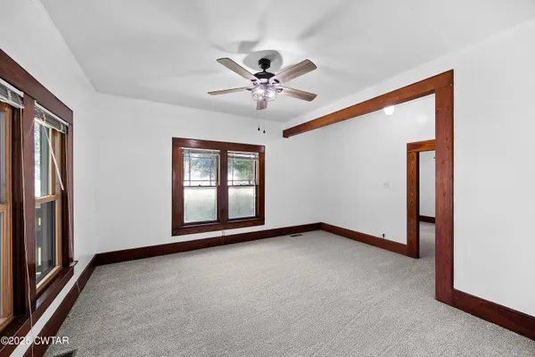 a view of an empty room with a window