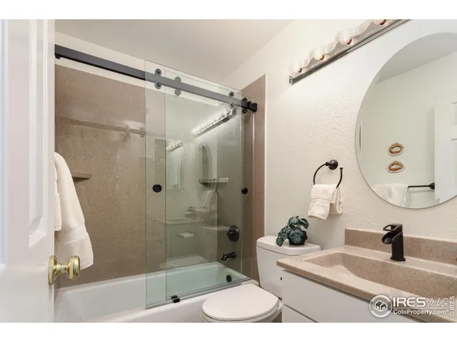 a view of balcony with wooden floor