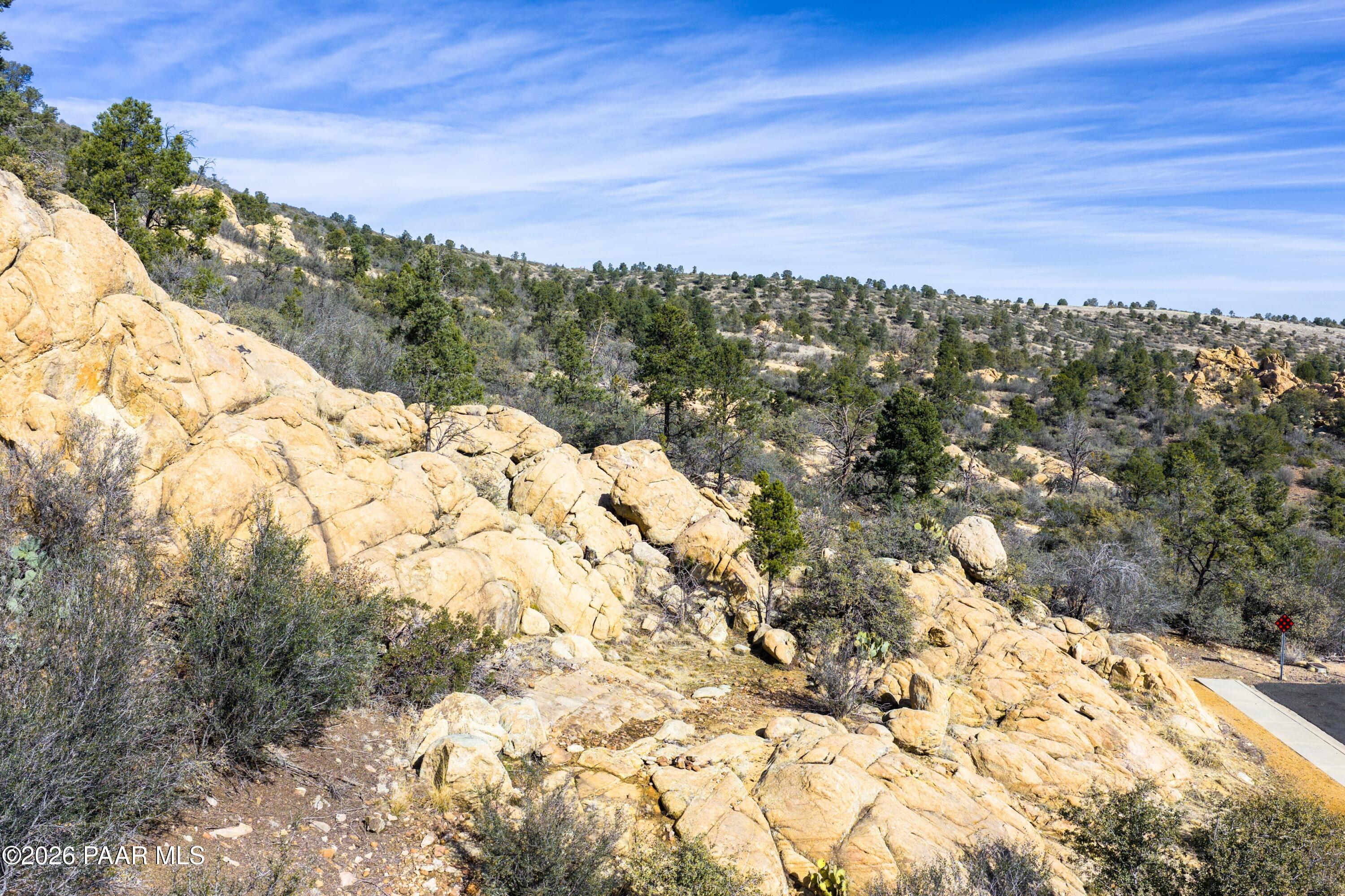 3076 La Questa Prescott, AZ 86305 - Photo 14 of 38 a view of a yard with a mountain view in back