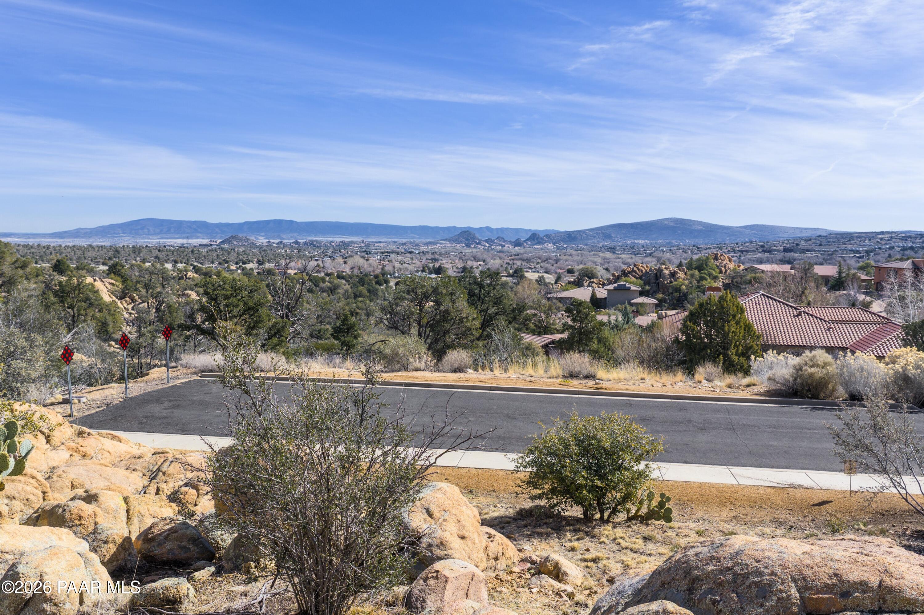 3076 La Questa Prescott, AZ 86305 - Photo 18 of 38 a view of a lake with a city