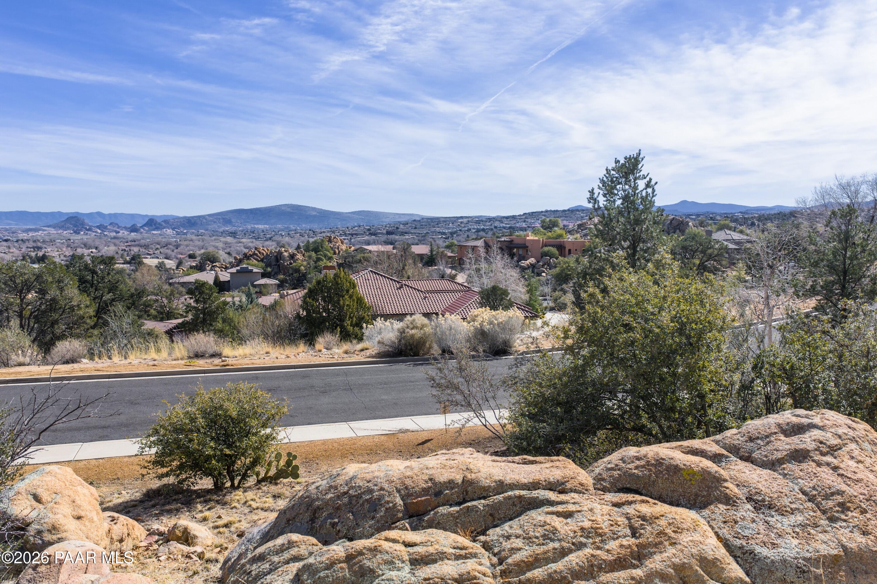 3076 La Questa Prescott, AZ 86305 - Photo 19 of 38 a view of a terrace with a garden