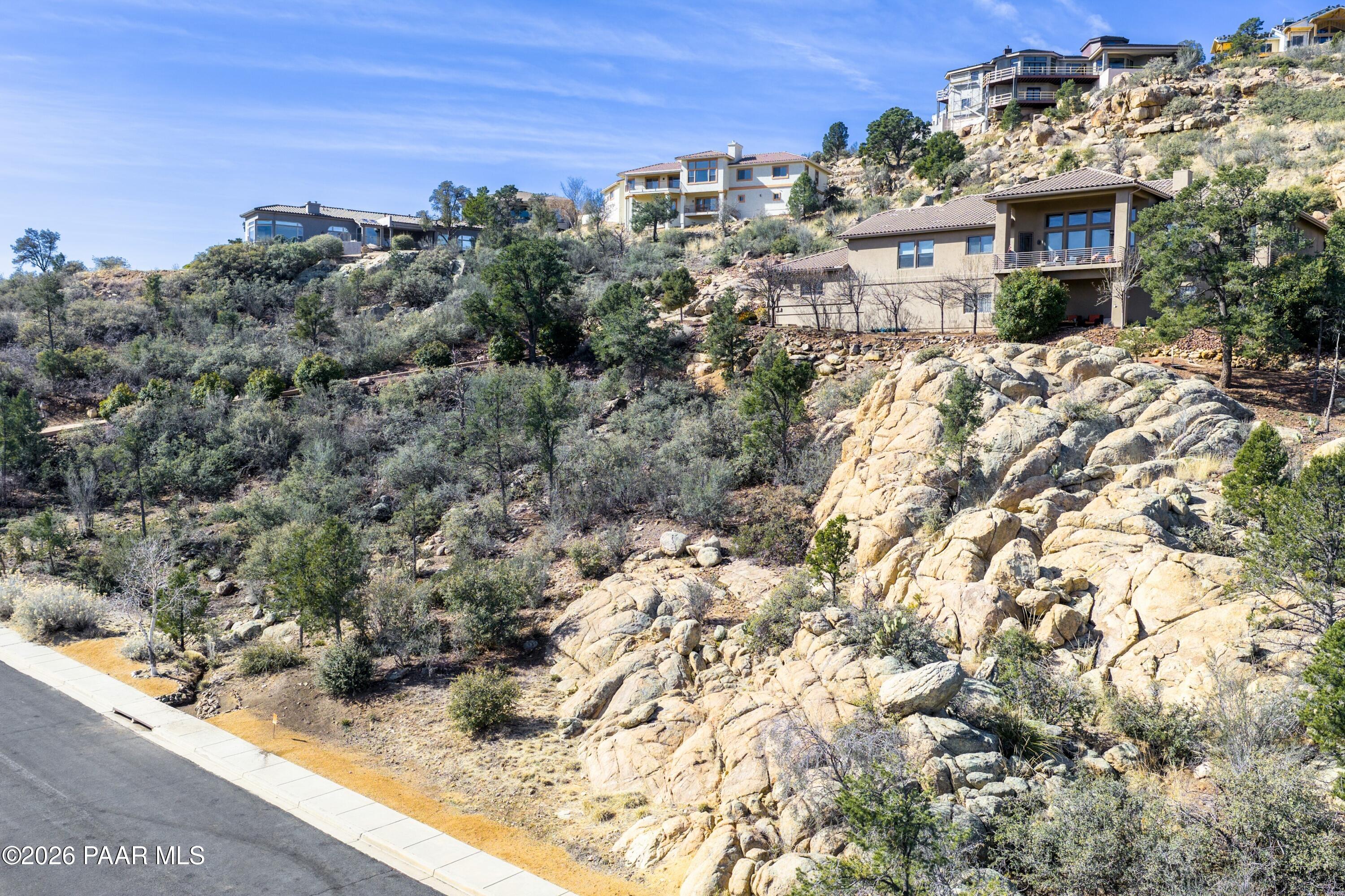 3076 La Questa Prescott, AZ 86305 - Photo 28 of 38 a view of building with an outdoor space
