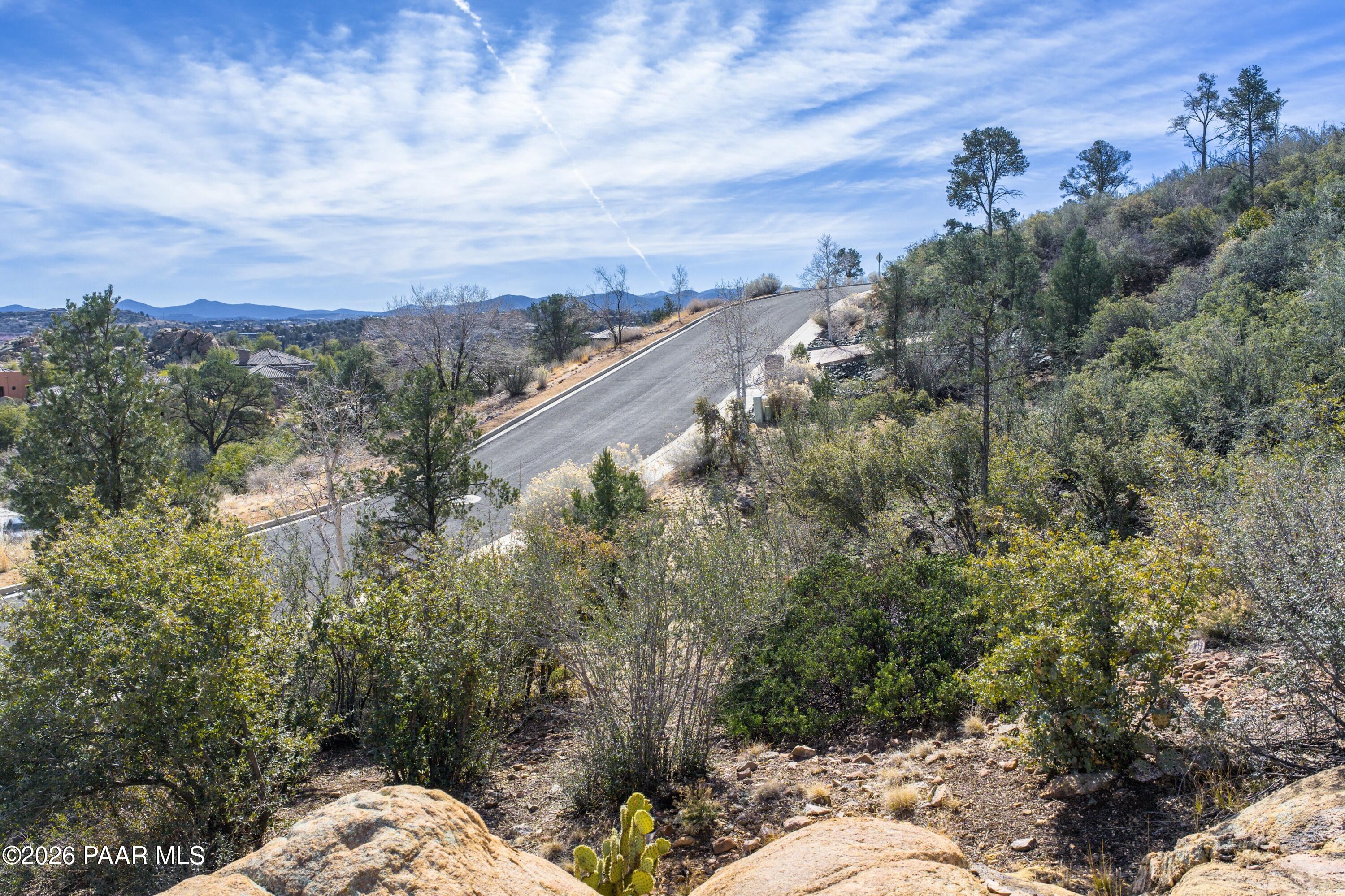 3076 La Questa Prescott, AZ 86305 - Photo 3 of 38 a view of a city with lush green forest