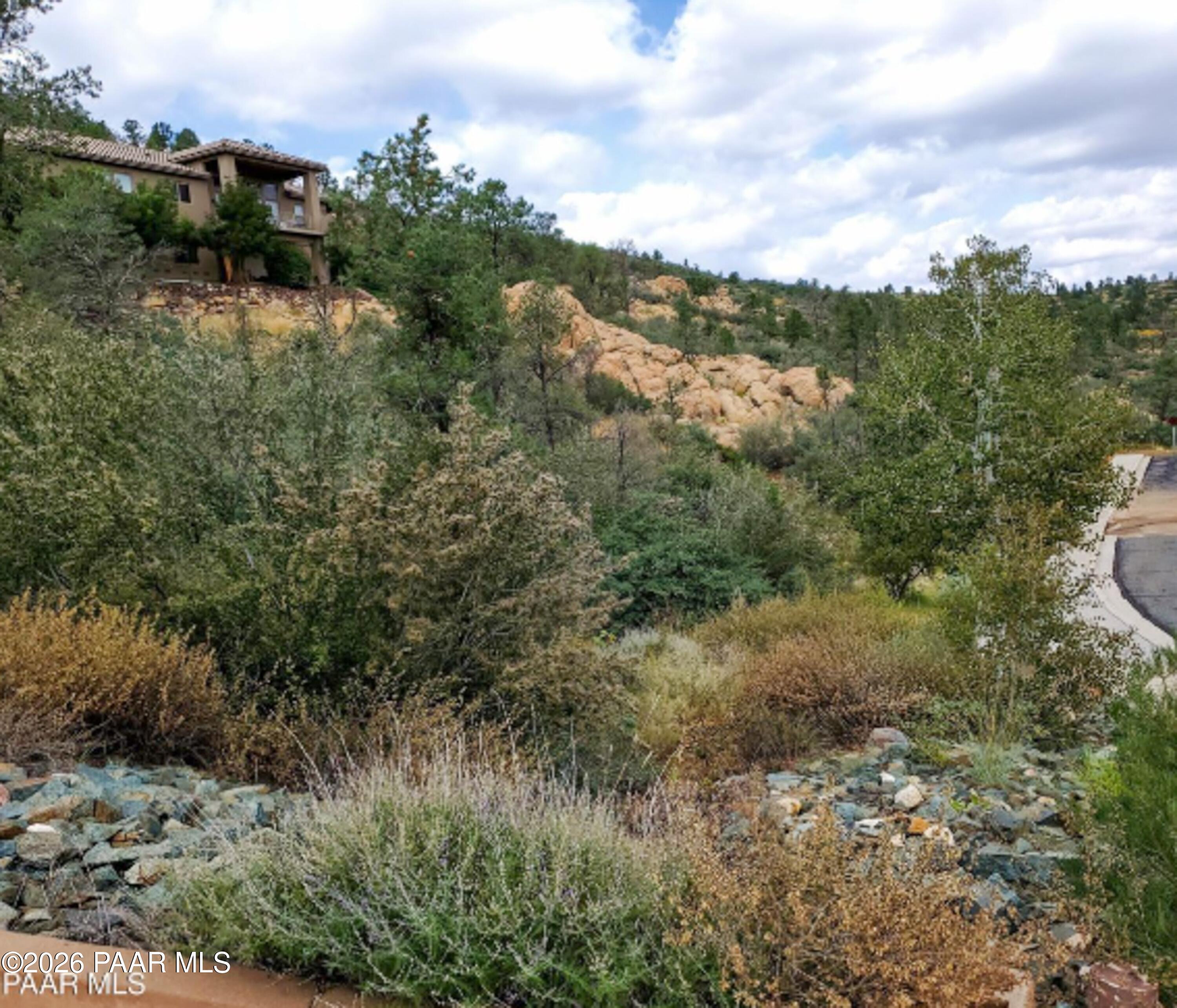 3076 La Questa Prescott, AZ 86305 - Photo 34 of 38 a view of a lake with a city
