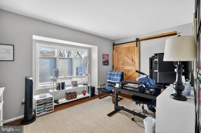 a room with furniture and a window